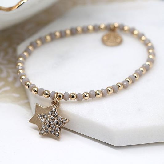 Gold and Grey bead bracelet with double star and crystal charms.