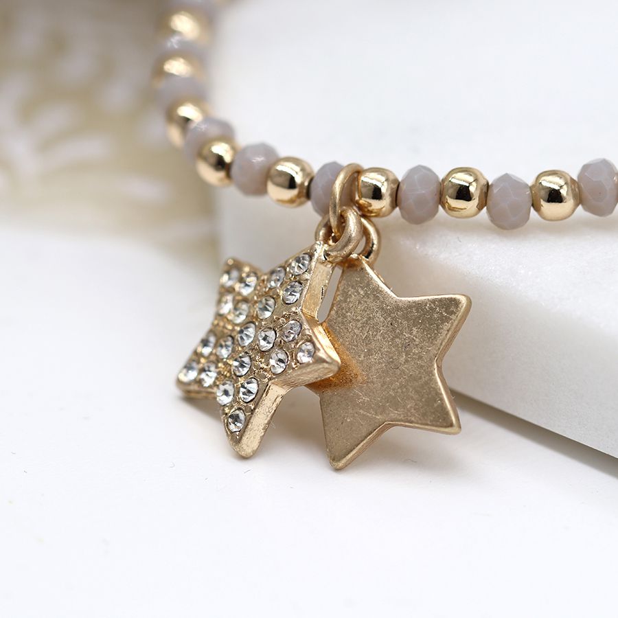 Gold and Grey bead bracelet with double star and crystal charms.