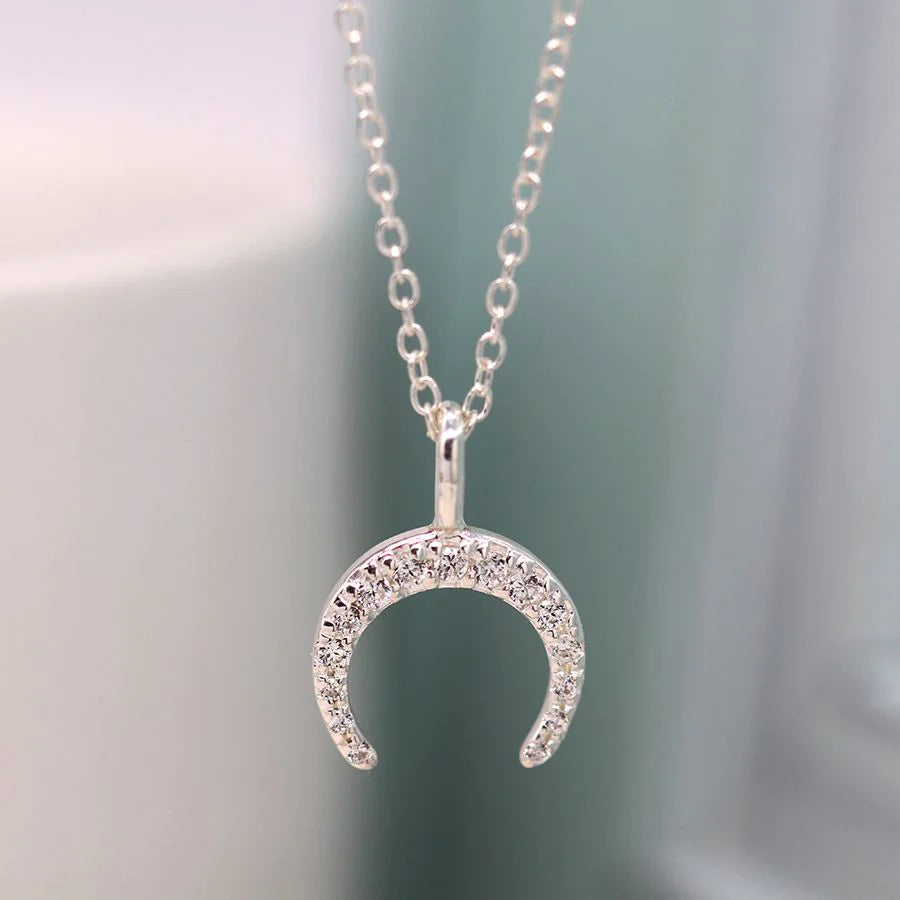 Sterling silver inverted crystal crescent necklace